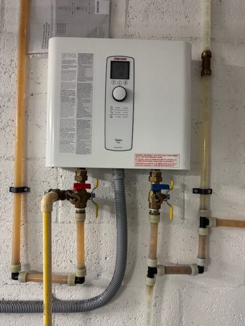 Tankless water heater installation shown in the A Plus Plumbing gallery